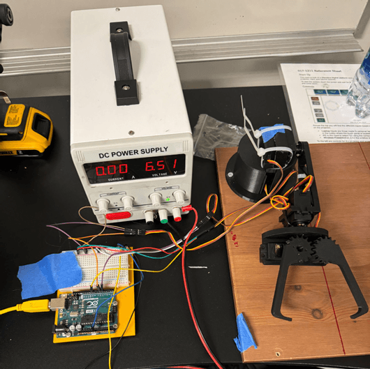 Can Arm on wooden base during powered testing