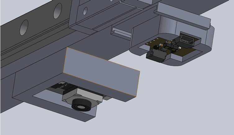 CAD of camera and sensor housings on the gantry rail